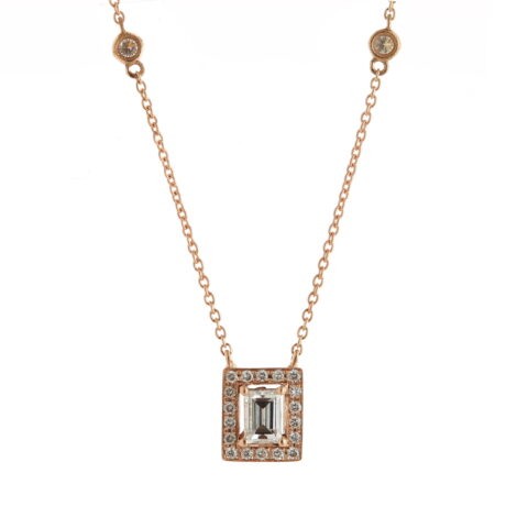 Fine and elegant Rose Gold Necklace with White Diamonds and a Baguette Central Diamond